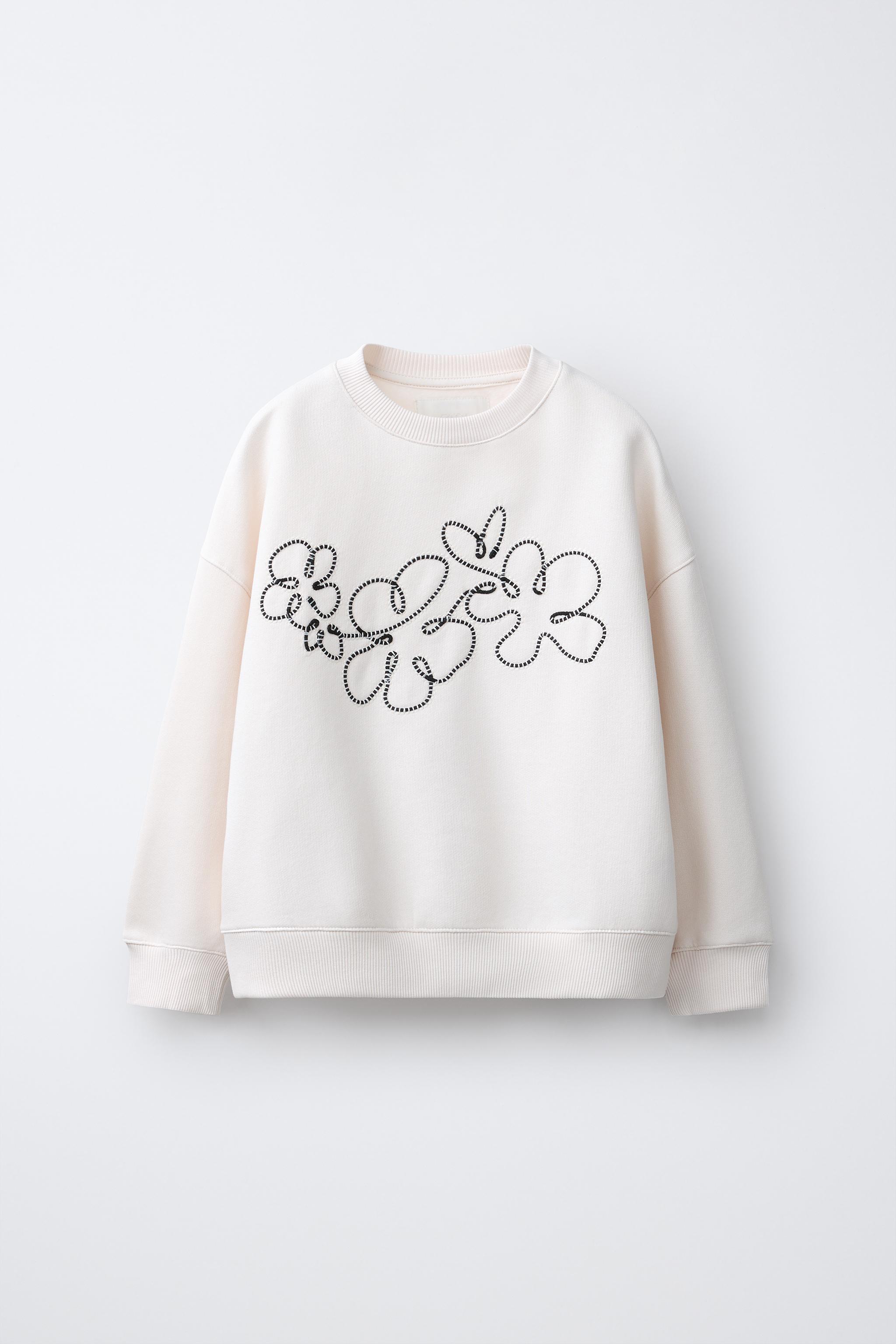 DRAWSTRING FLOWER SWEATSHIRT
